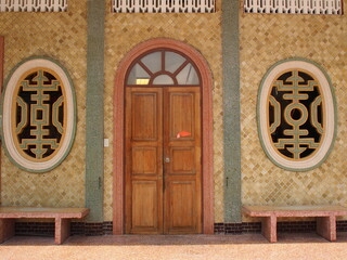 The doors, windows and walls are decorated with ancient Chinese patterns.