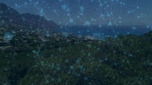 Third frame starting network overlay lines, nodes fading and expanding over wooded hill shore town