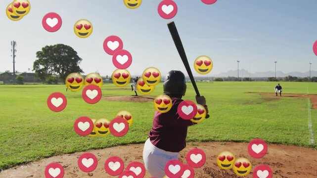 Batter gripping bat in batting stance as reaction icons floating then fading behind baseball action