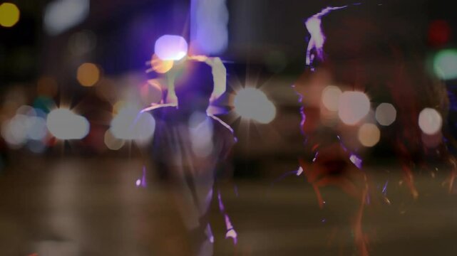 Singer gripping mic stand and singing music for street crowd with animated bokeh lights swirling