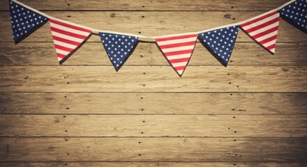 Obraz premium American flag bunting strung horizontally across a distressed wooden wall background