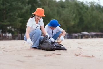 Cleanup effort by volunteers at the beach in sunny weather promotes environmental awareness and community spirit