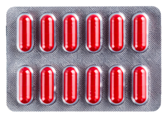 a blister pack of red pills isolated on white background
