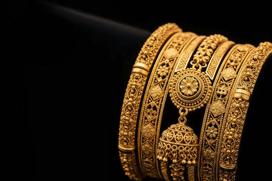 Luxury Gold Bangle Set - Indian Wedding & Festival Collection in dark background.