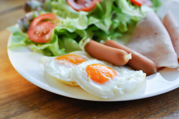 egg , sausage and ham with vegetable or sunny side up egg