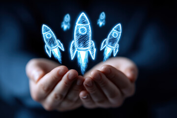 Startup growth innovation concept with glowing rocket icons in male hands, symbolizing business success, investment, and futuristic technology