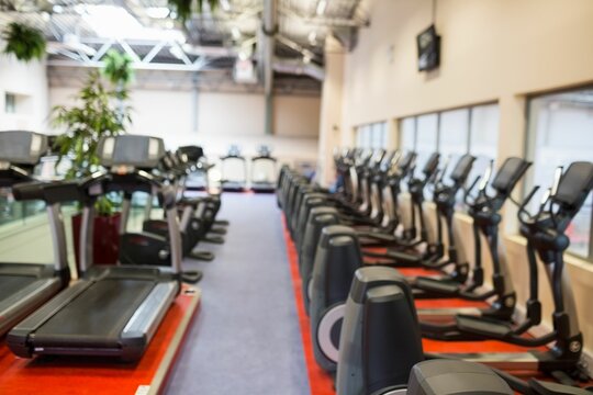 Fototapeta Exercise equipment in gym