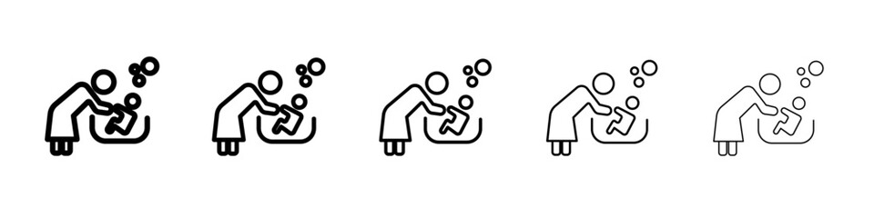 Mother washing baby in bath tub icon black and white vector sign