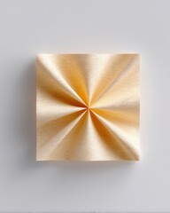 Textured Gold Napkin Folded in Square Pattern