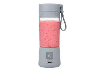Portable blender filled with a pink smoothie on transparent background