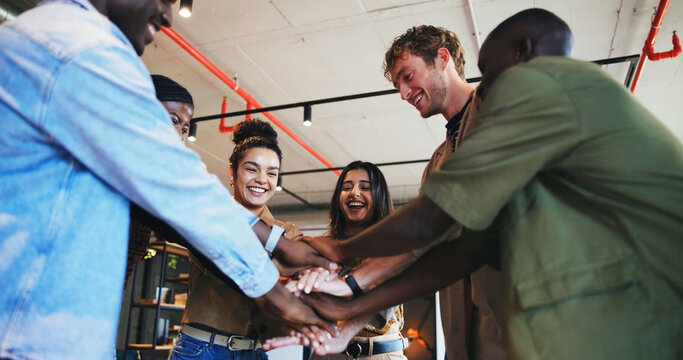 Collaboration, huddle and motivation with business people in office together for celebration. Circle, pile of hands and scrum with employee team in creative workplace for bonus, goals or target