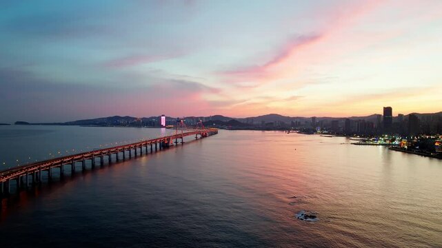 Sunset over the Dalian Xinghai Bay, China.