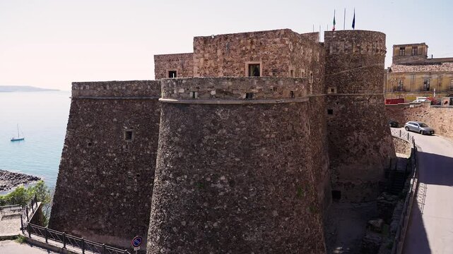 Murat Castle standing tall on the coast of Pizzo, Calabria, with the Tyrrhenian Sea in the background