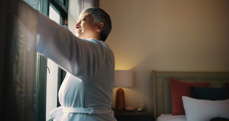 Open, window and woman in bedroom, morning or smile for sunrise on weekend, confident and...