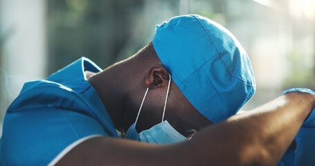 Cry, sad and healthcare with doctor in hospital for surgery error, patient death and depression....