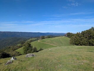 trail on a hilltop with blue sky