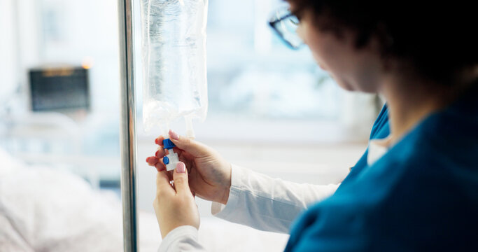 Nurse, hands and check iv drip in hospital for medication, illness treatment or patient nutrients. Liquid, woman and monitor intravenous infusion for hydration, anesthesia and prepare prescription - Powered by Adobe