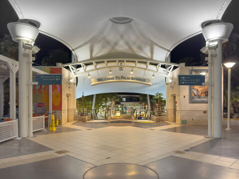 Palm Springs, California USA - June 19 2025 : Entrance to the Sonny Bono Concourse at the Palm Springs Airport Terminal on a very hot 100 degrees Fahrenheit summer night