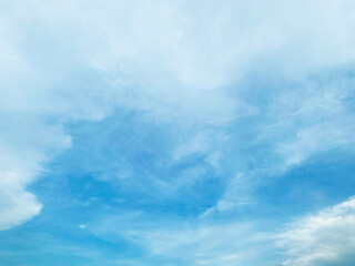 Beautiful clouds during spring time in a Sunny day. Blue sky and white fluffy clouds.