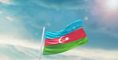 Azerbaijan national flag waving with beautiful sky.