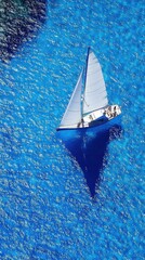 Sailboat on Azure Ocean Waters