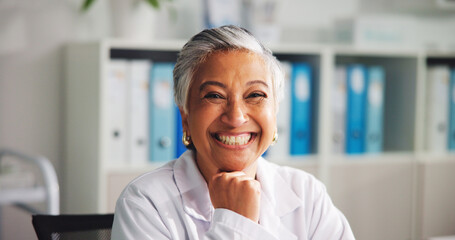 Fototapeta na wymiar Portrait, doctor and woman with smile in office, hospital and pride for healthcare services or help. Confident, mature person and medical professional with happiness in clinic, specialist and USA