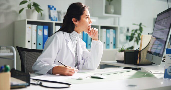 Computer, woman and doctor thinking with report in clinic for research, diagnosis or treatment. Tech, medical service and female healthcare worker with document for paperwork in hospital office