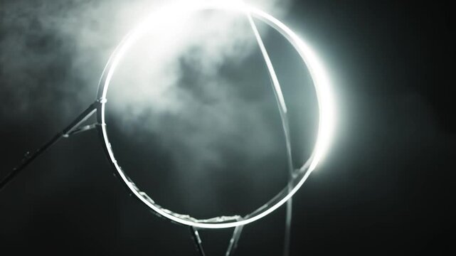 Broken circular structure abstract gray texture dark background monochromatic close up