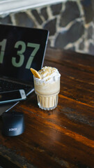 Frappé is made from instant coffee, water, sugar, and ice. Some variations also add milk.