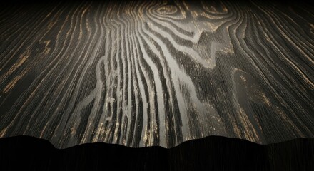 A close up shot of a dark wood surface with prominent grain patterns and textured appearance in dim lighting