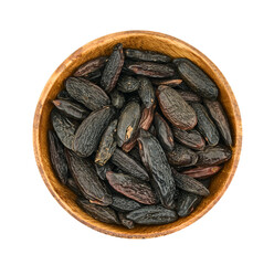 top view flat lay pile of tonka bean in wood bowl cutout
