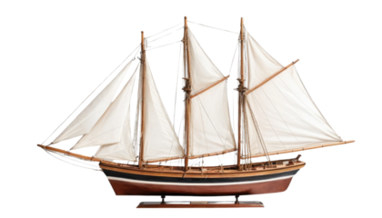 A wooden sailboat with open sails, isolated on a white background