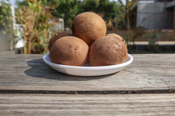 Sapota fruit or Chikoo fruit, sweet in taste. Sapodilla is tropical fruit with seed inside