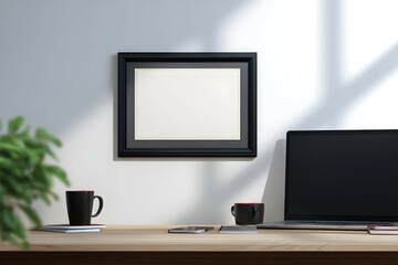 A black framed white picture hangs on a wall
