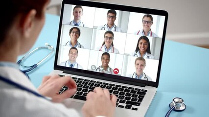 Doctor Leading Online Medical Conference with Diverse Team - Powered by Adobe