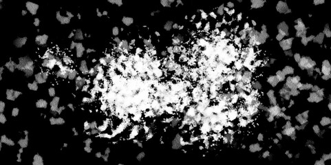 Obraz premium Snowflakes on dark background. white icy snowflakes isolated on black background, natural background. white crystalline powder on a black background. sugar dust. texture, pattern and clipping.