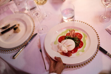Gourmet Burrata Salad at Dinner Table