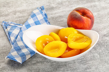 Ripe sweet and juicy canned peach