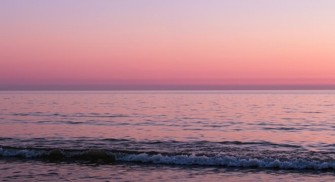 Serene ocean sunset with soft pink sky, calm waves washing shore. Peaceful seascape, romantic evening atmosphere, coastal tranquility concept - Powered by Adobe