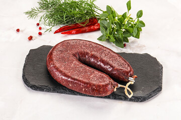 Delicious dry cured beef basturma on table, closeup