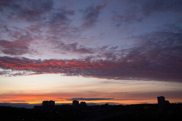The sun went down below the horizon. beautiful sunset over the city. house layouts