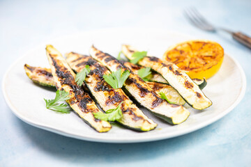 Grilled vegetables appetizer top view on round plate