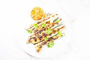Grilled vegetables appetizer top view on round plate