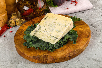 Blue cheese piece over board