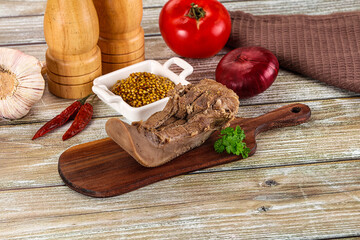 Steamed pork tongue with mustard