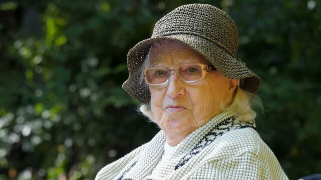Portrait of an old woman in a hat