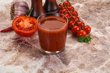 Fresh tomato juice in the glass