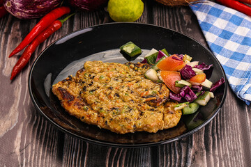 Tasty chicken steak with vegetables