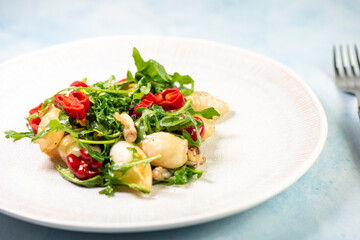Calamari with salad and red peppers