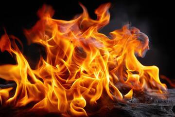 Fototapeta premium Flames dancing in the dark creating a warm and vibrant atmosphere